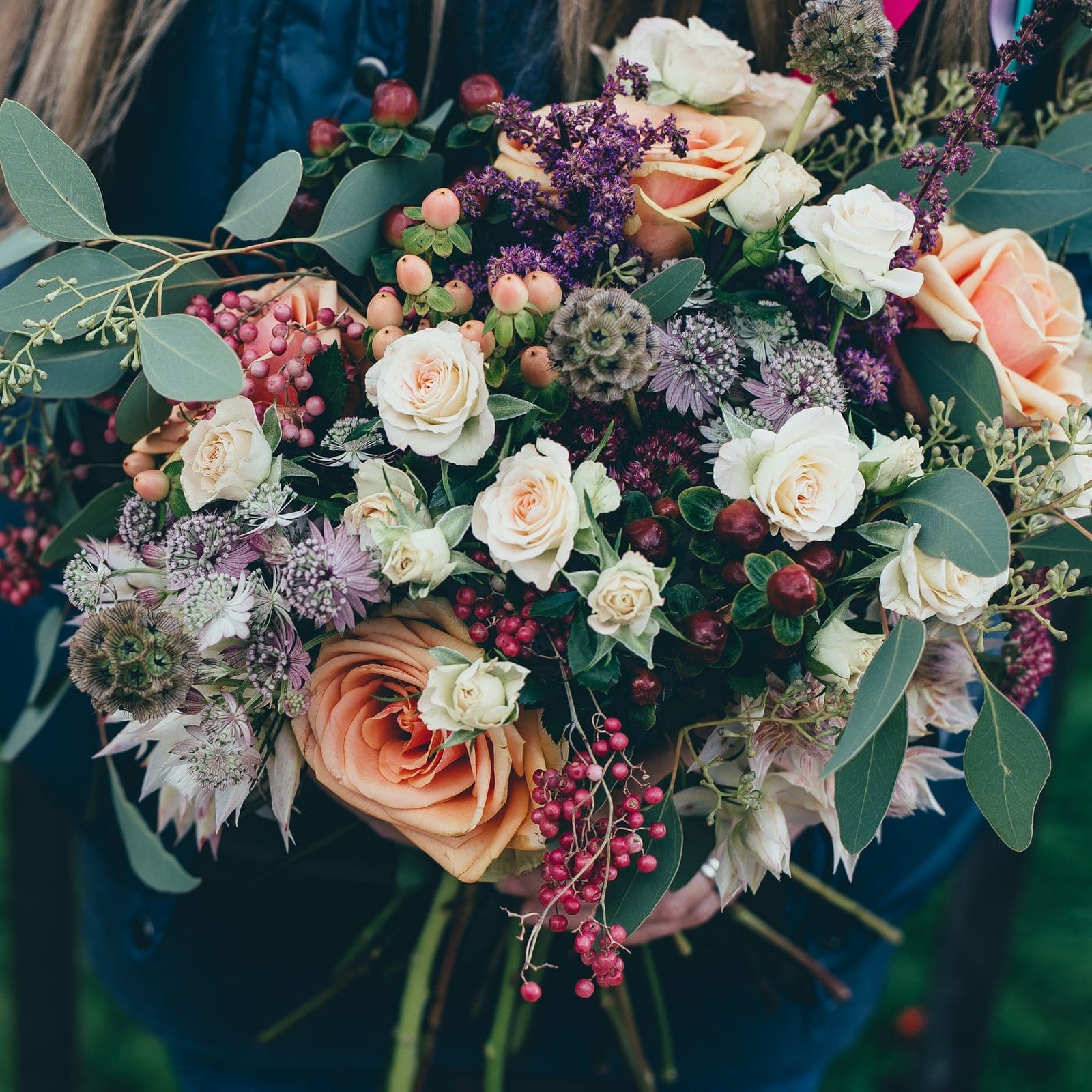 A bouquet of dahlias and roses